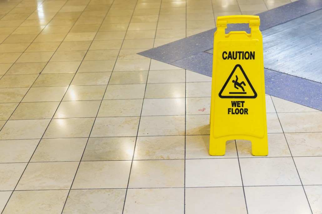 yellow wet sign on the floor